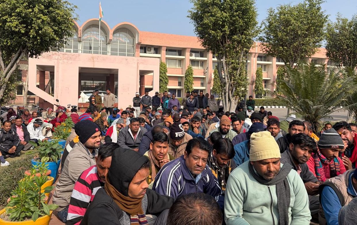 The temporary employees of the university staged a sit-in protest.