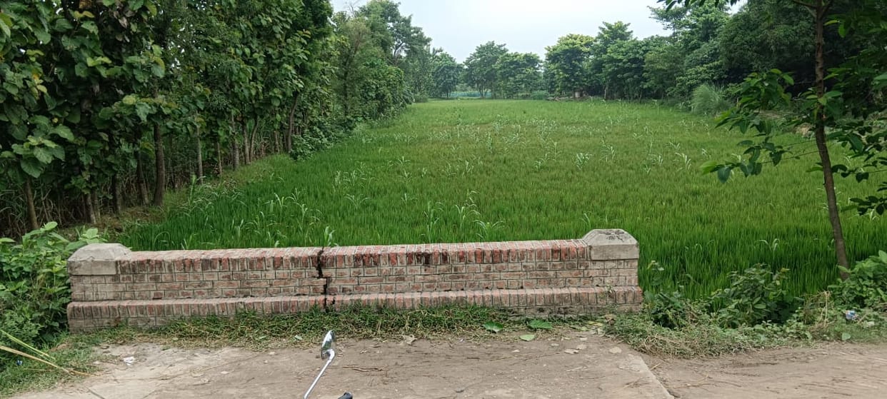 The canal exists only on paper, while farmers are growing crops on the land.