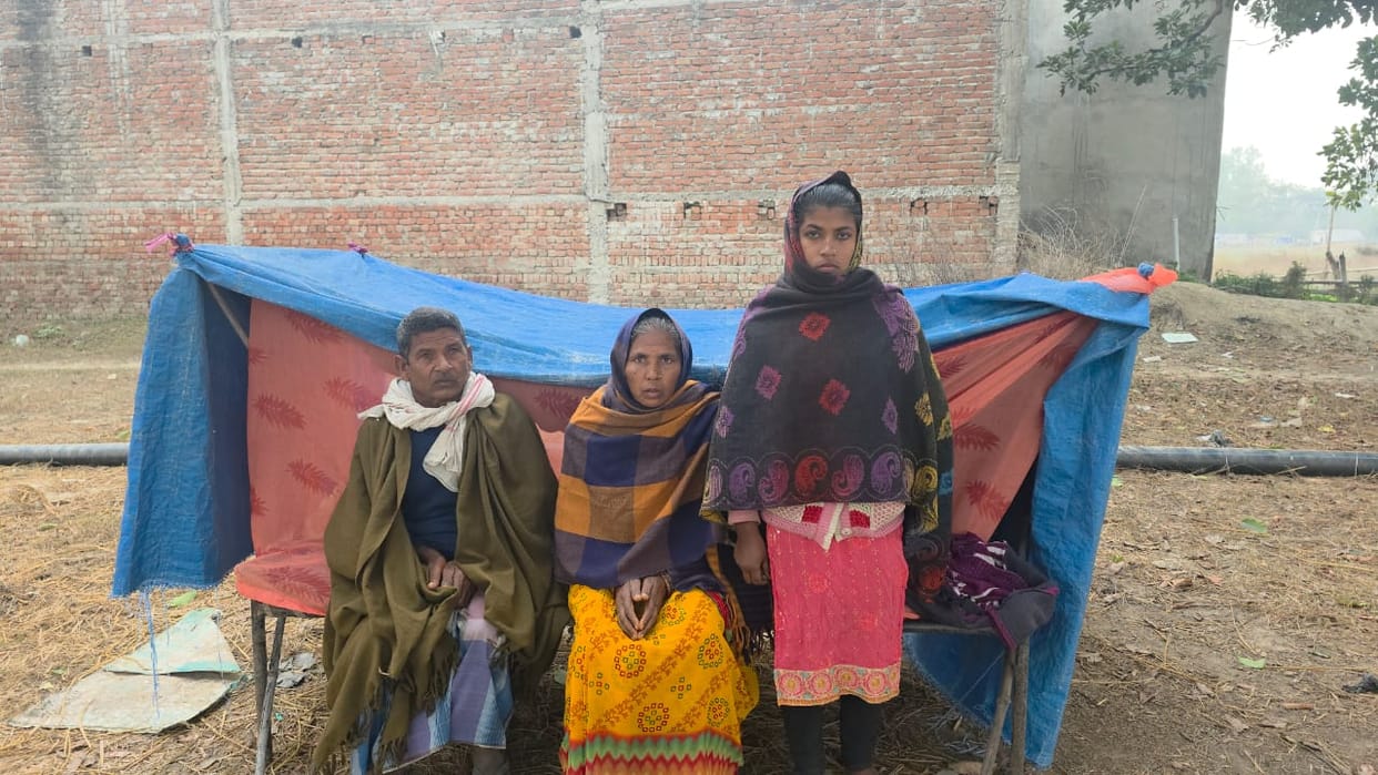Another person has occupied their home...the disabled family is living under a tree.