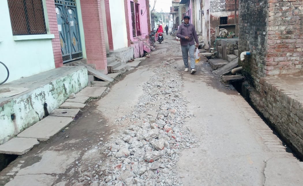 Road left unrepaired after laying water lines