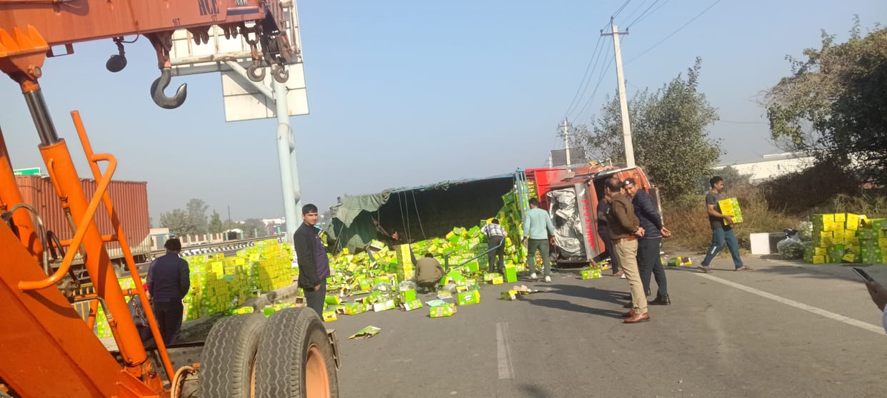 A truck loaded with cumin seeds overturned in front of the MLA's residence on GT Road.