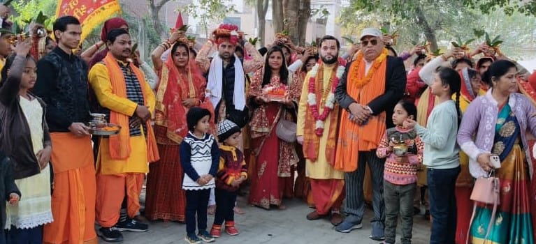The Shrimad Bhagwat Katha begins with a procession carrying a sacred pot.