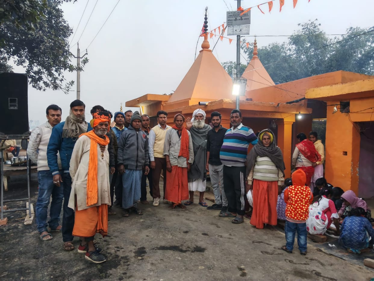 A large crowd of devotees gathered at the community feast at the ancient Shiva temple.