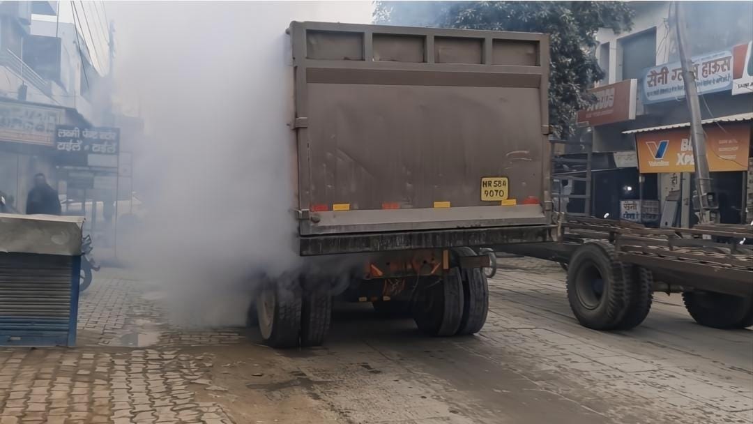 Tyre of a moving dumper filled with sand caught fire, accident averted