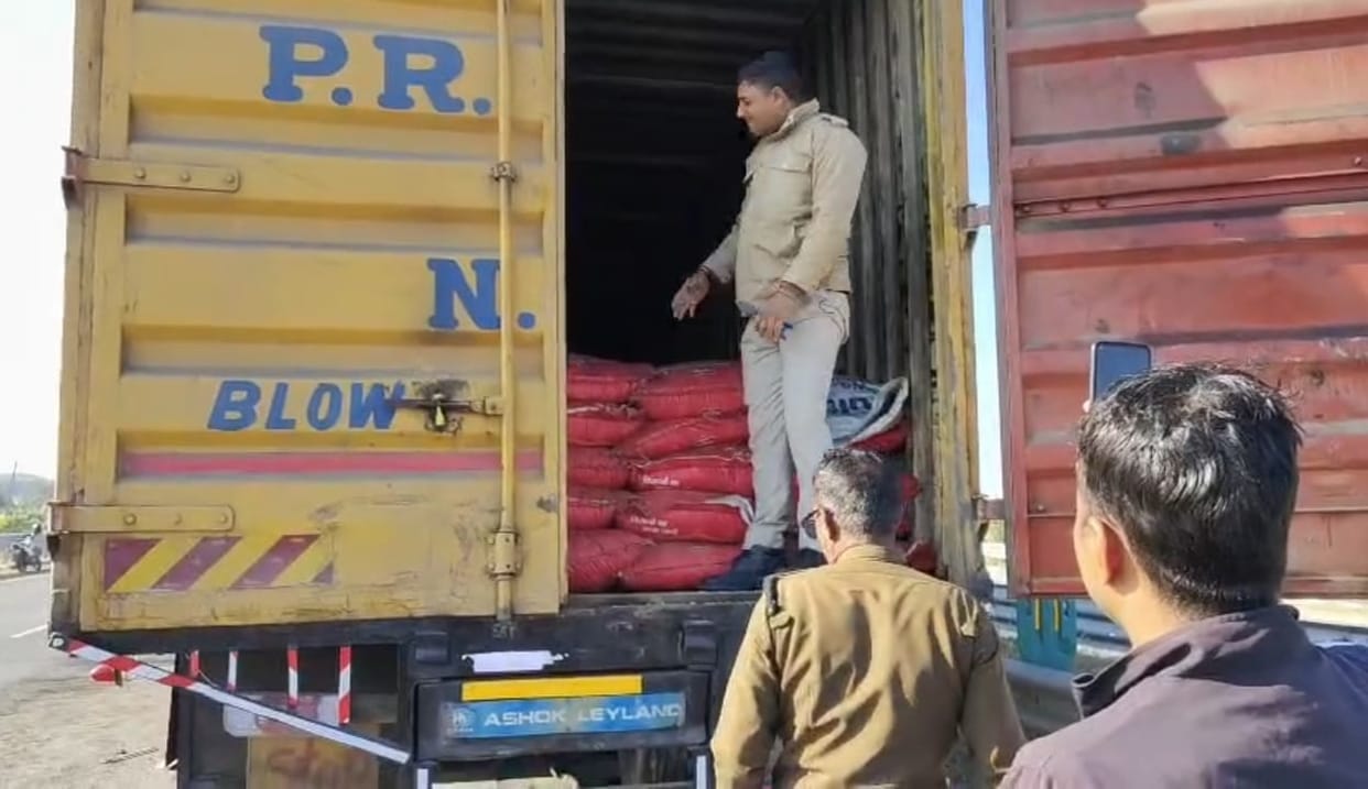 The container that hit the car was being used for smuggling alcohol.