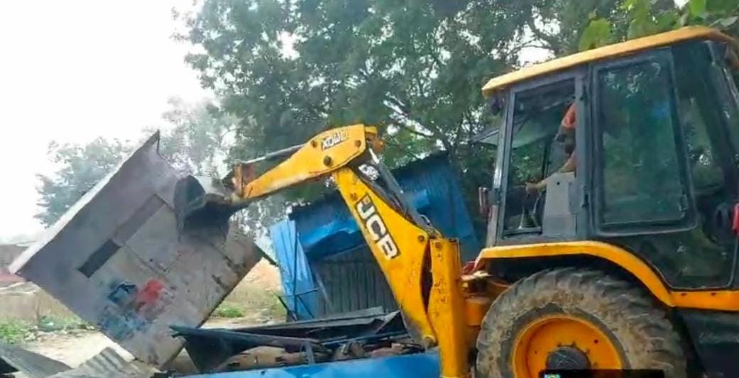 Bulldozer ran on 35 shops built on government land