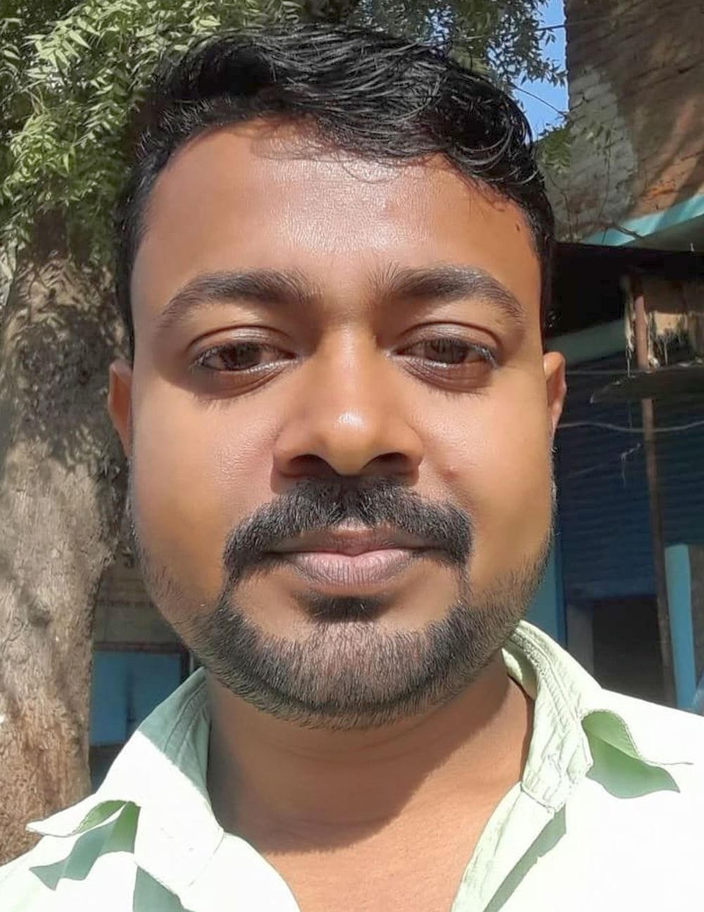Two people, including a railway ticket collector on a motorcycle, were killed in a truck collision.