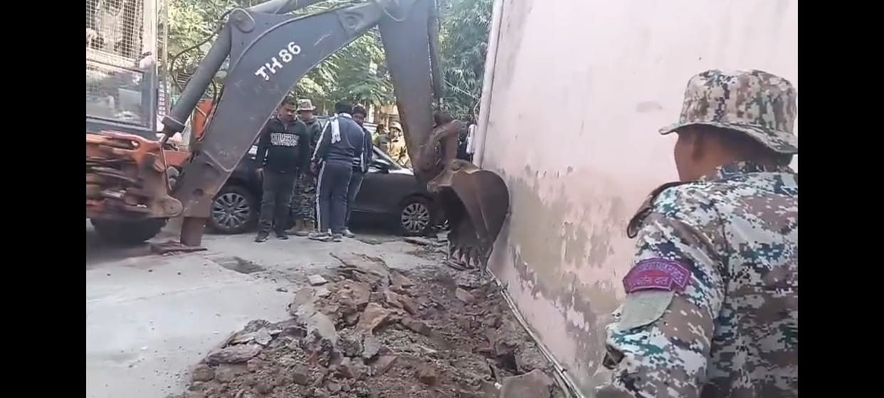 Corporation's bulldozer runs on encroachment, altercation with the team