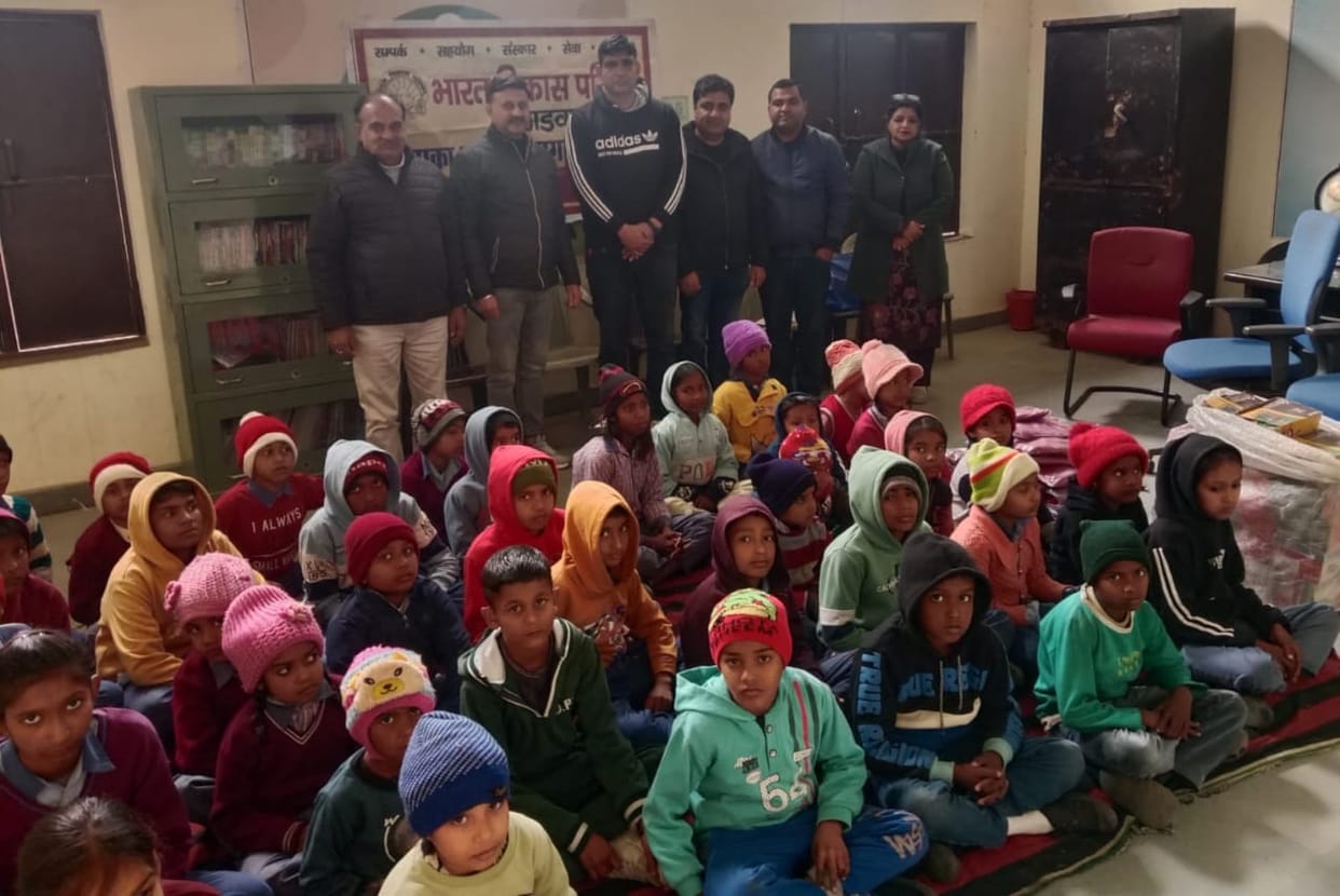 Warm jerseys and shoes were distributed to needy students.
