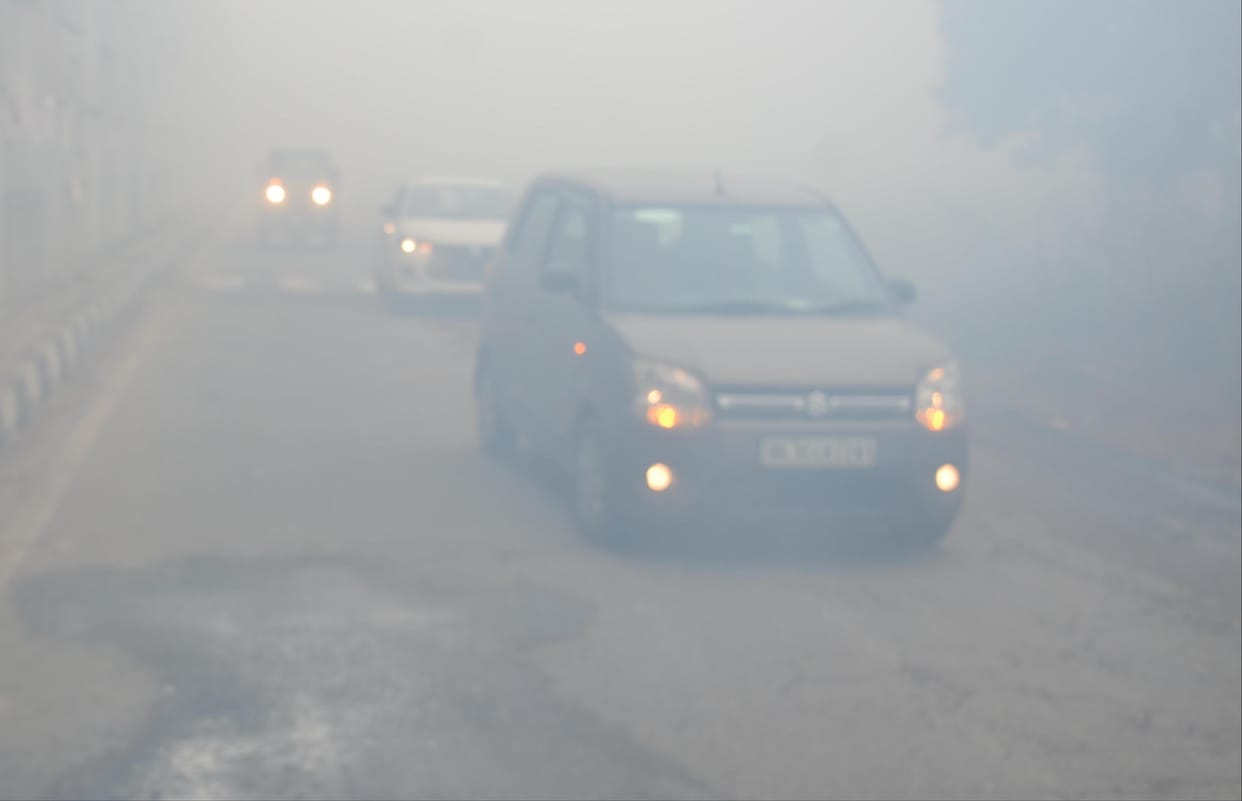 Dense fog prevailed in the district, and the cold wave caused a chilling effect.