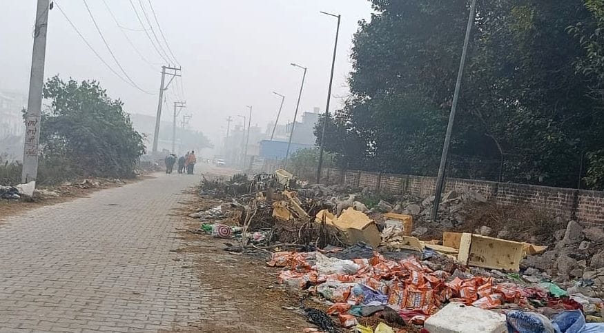 Garbage has been lying near the canal for several days.