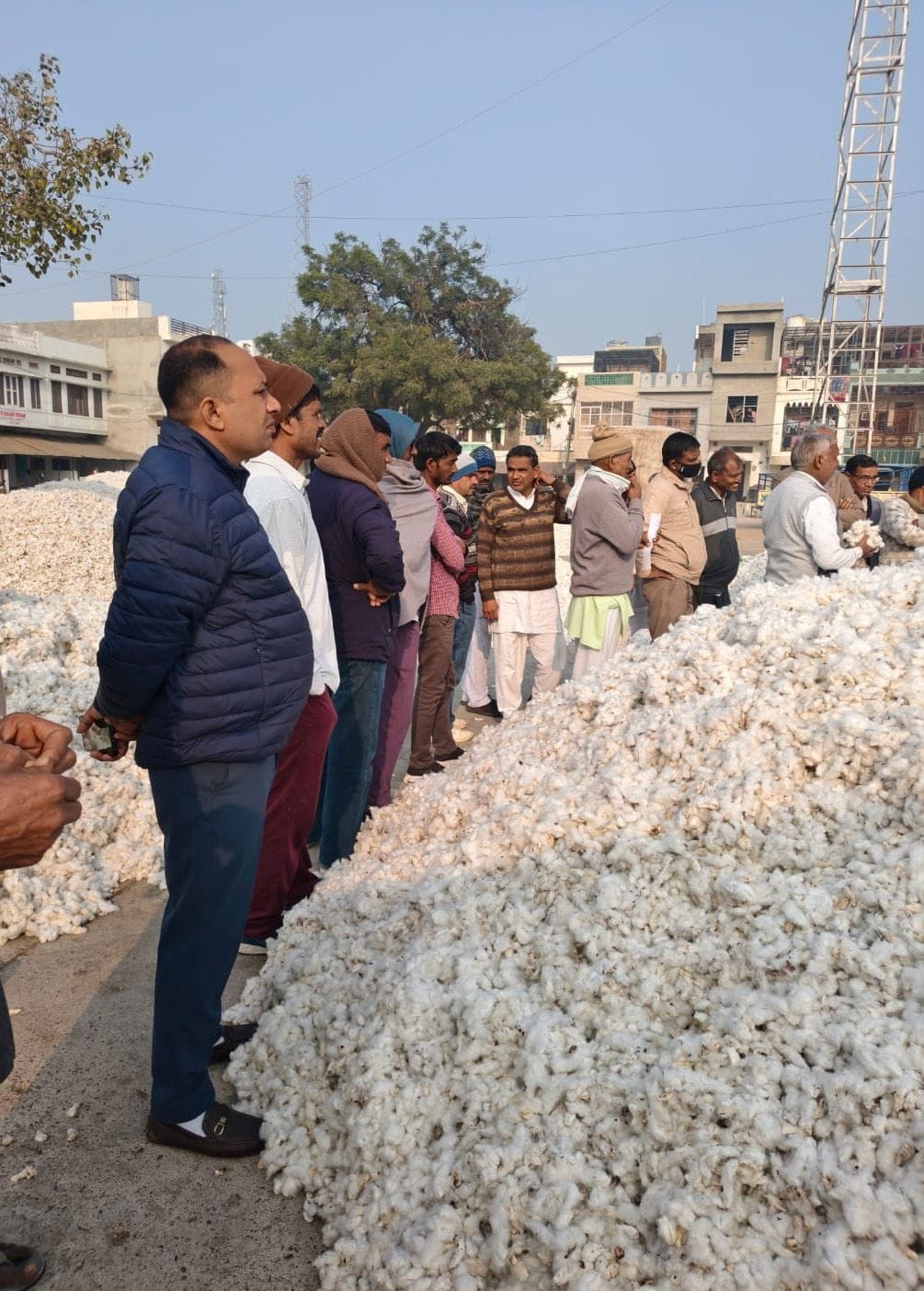 The Market Committee Chairman inspected the market and spoke with the farmers.