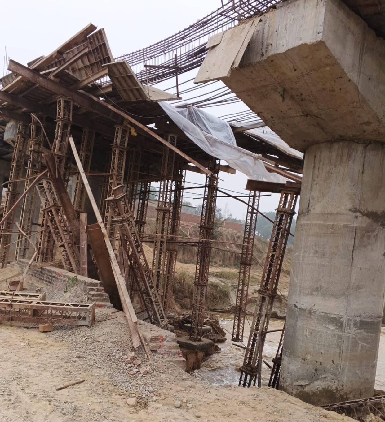 The construction of the bridge has come to a standstill due to the inflow of water in the Sasur Khaderi river.