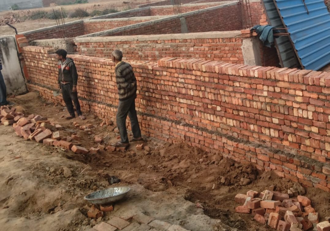 Village society was freed from encroachment 

Construction of boundary wall on the land started