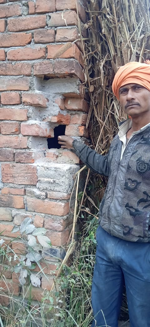 Attempted theft by breaking into the back wall of the house