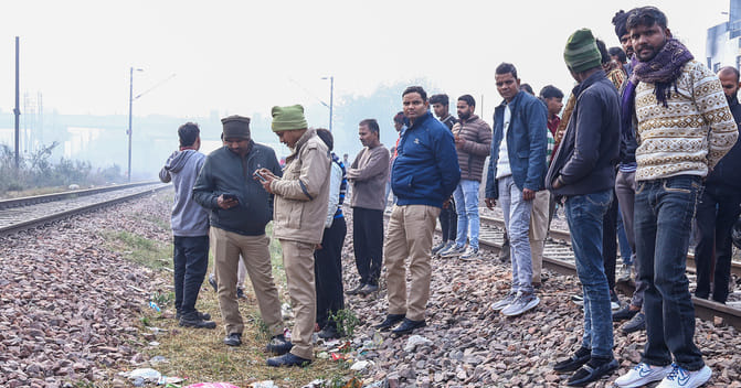 Sitting on the railway track, he called his angry wife and then died after being hit by a train.