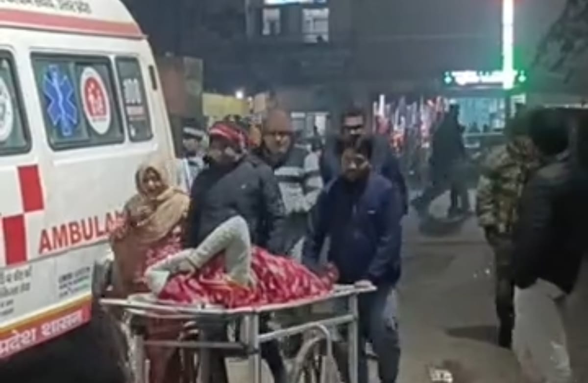 Brother and sister riding a bike injured after being hit by an ambulance