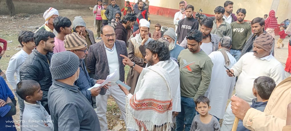 Protest against the demolition of a wall built on barren land; the revenue team returned without carrying out the demolition