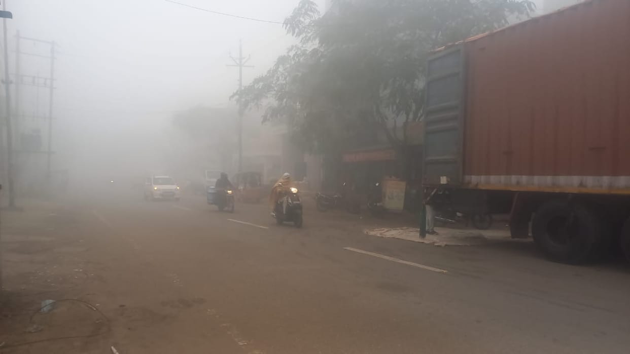 Vehicles were seen crawling through the blanket of fog.