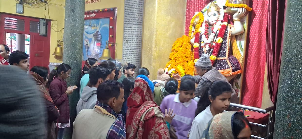 Crowds of faith gather in temples, and parks are filled with joy.