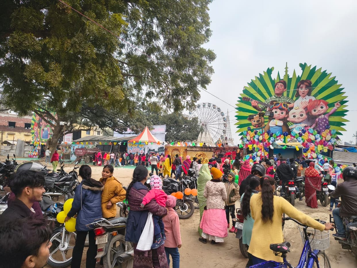 People immersed in New Year celebrations, crowd gathered at Darjiniya Tal
