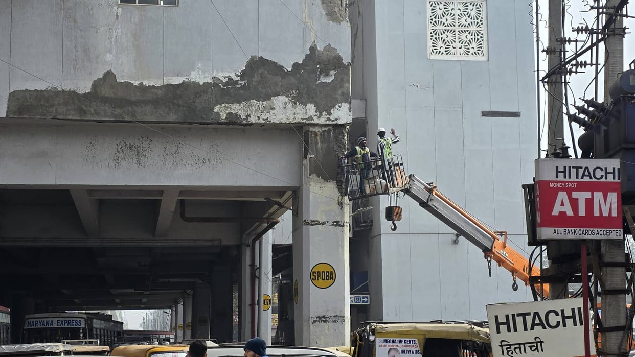 Repair work begins on metro buildings following complaints of peeling paint.