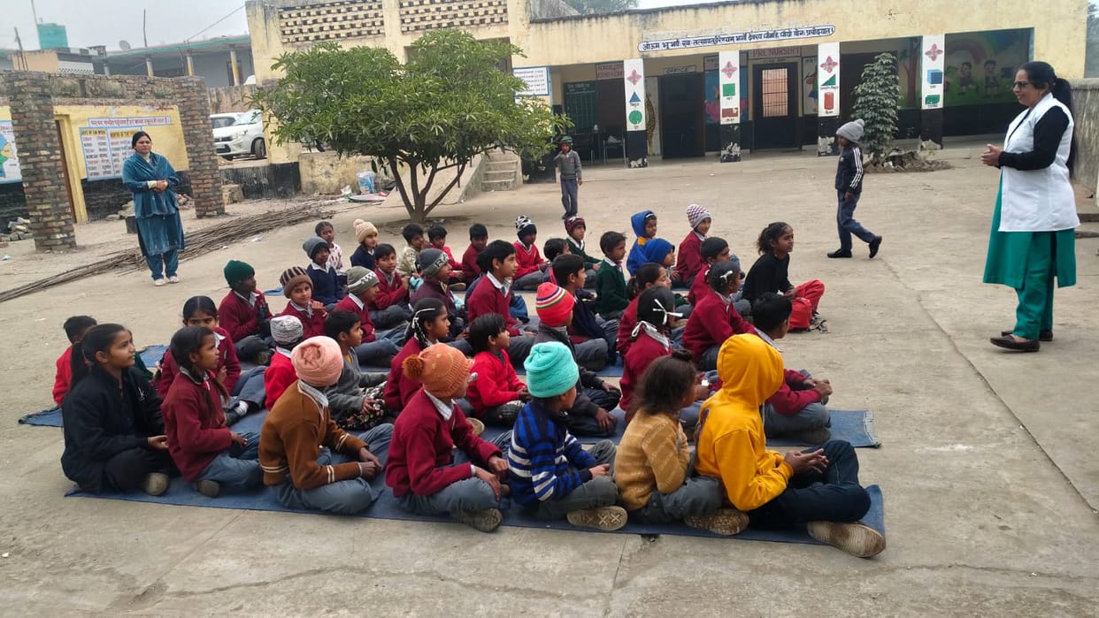 Teach school children the importance of hygiene and a balanced diet