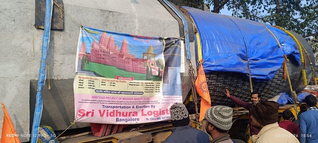 People gathered to see the Shiva Lingam being transported on a trolley with 111 wheels.