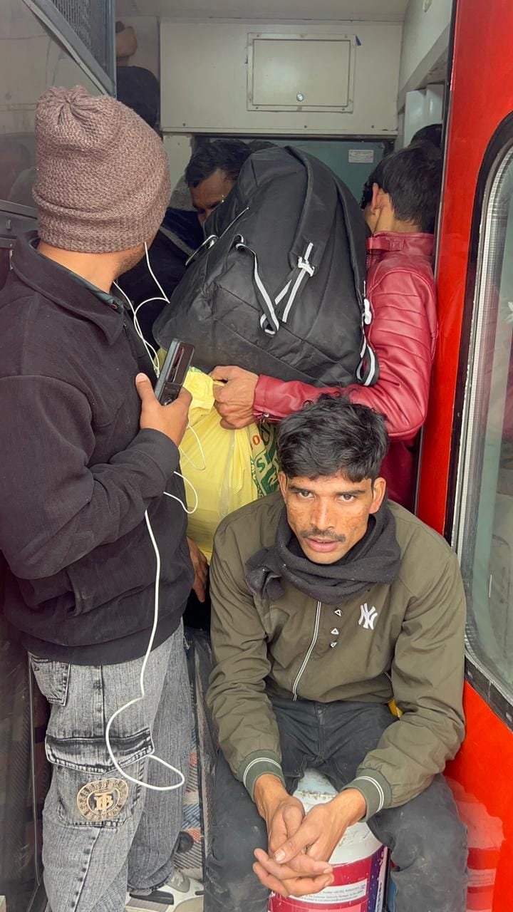 Train compartments were packed with passengers, forcing them to travel sitting near toilets.