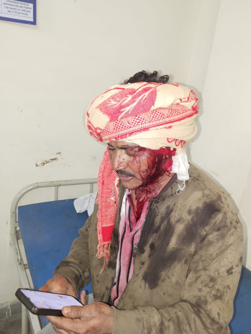 A young man was attacked in a dispute over taking a dog out to defecate.