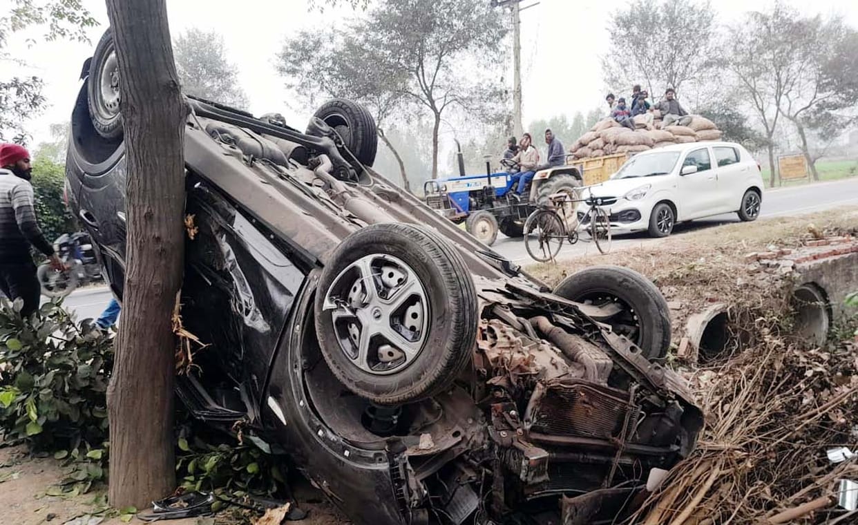 The car collided with a culvert in dense fog; the driver was injured.