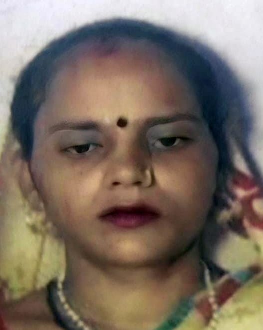 A woman died after falling from a roof during a monkey attack.