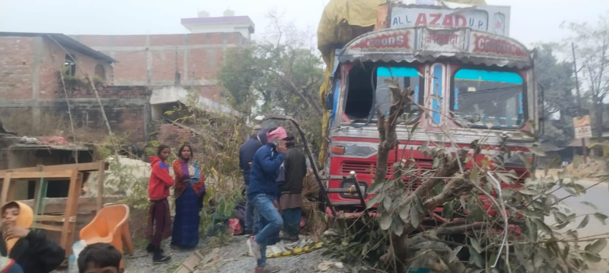 An out-of-control truck crashed into a tree and then into a hut, injuring a couple.
