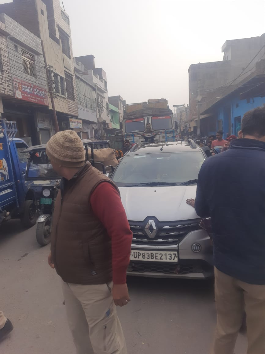 Parking of cars caused traffic jam in the market