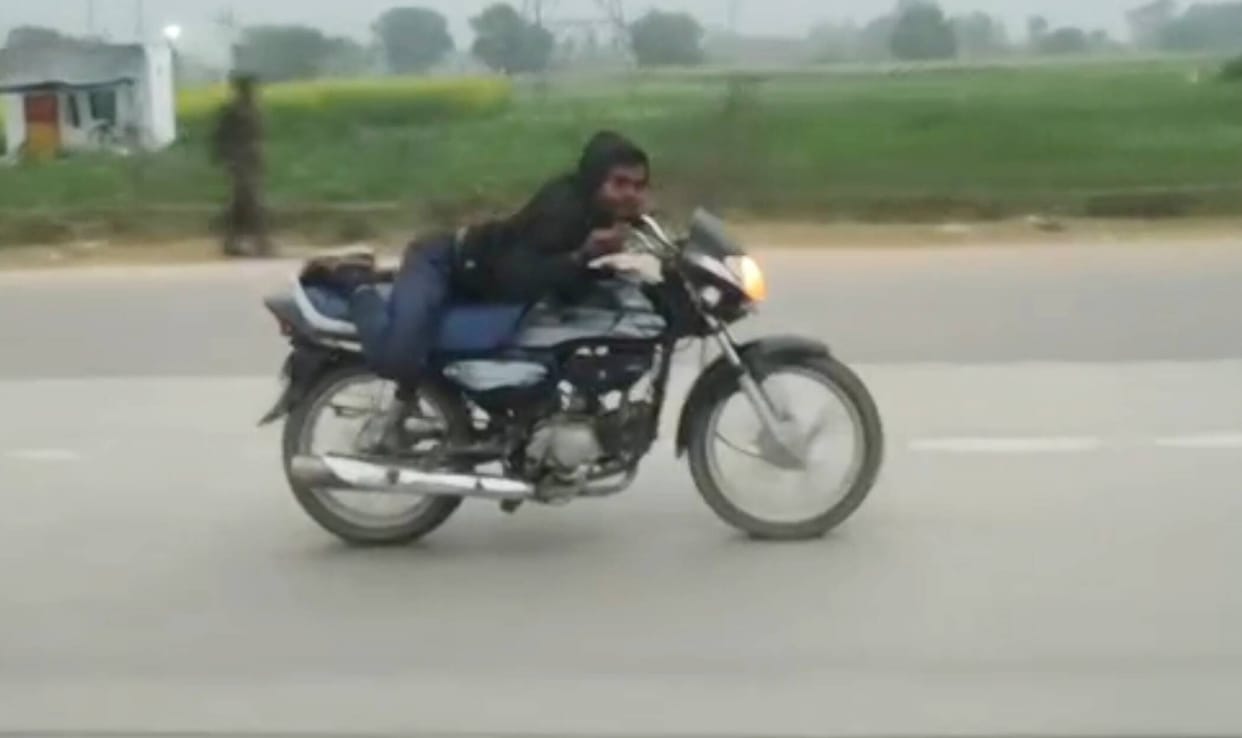 Video of bike rider doing stunts on highway goes viral
