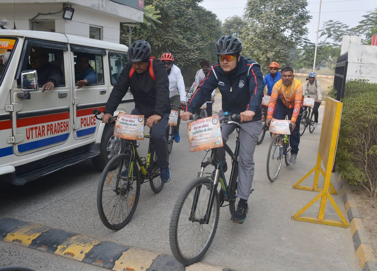 A bicycle tour was undertaken to spread the message of the Gita.