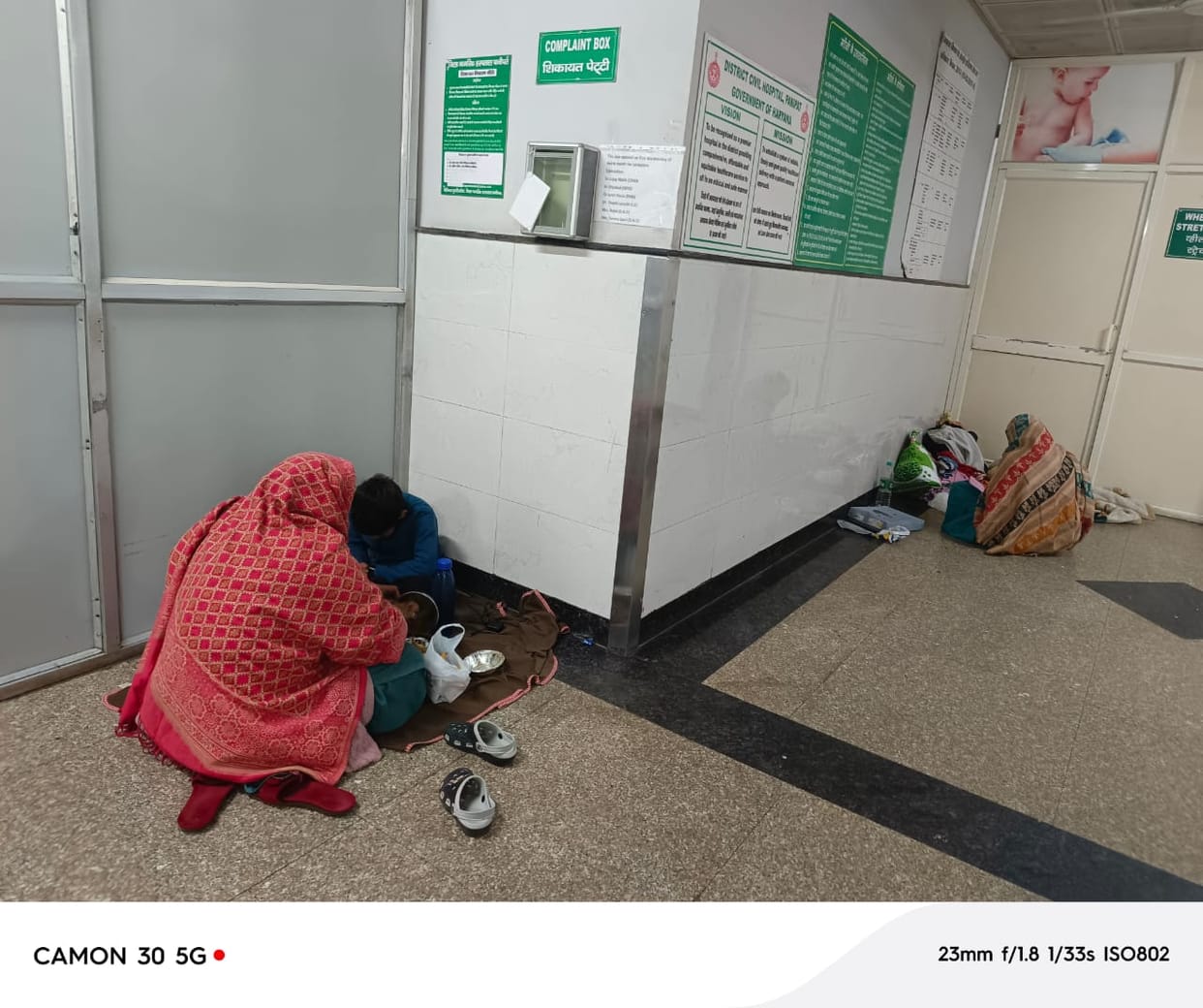 District Civil Hospital: Stray dogs sitting on bench and axes on floor