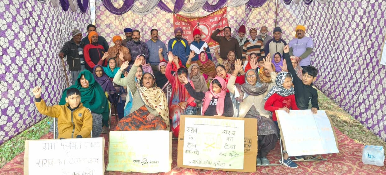 Villagers protest against liquor contract, take out rally