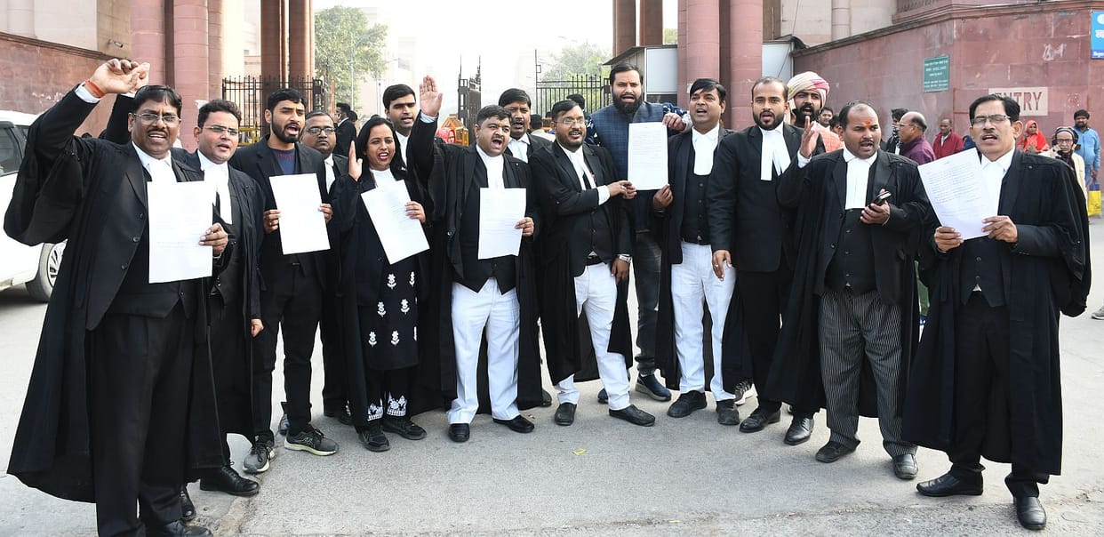 Advocates staged a protest by taking out a candle march