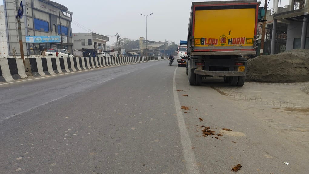 Trucks parked in front of dhabas are inviting accidents.