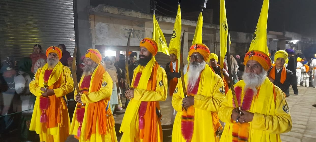 The congregation welcomed the Nagar Kirtan with a shower of flowers