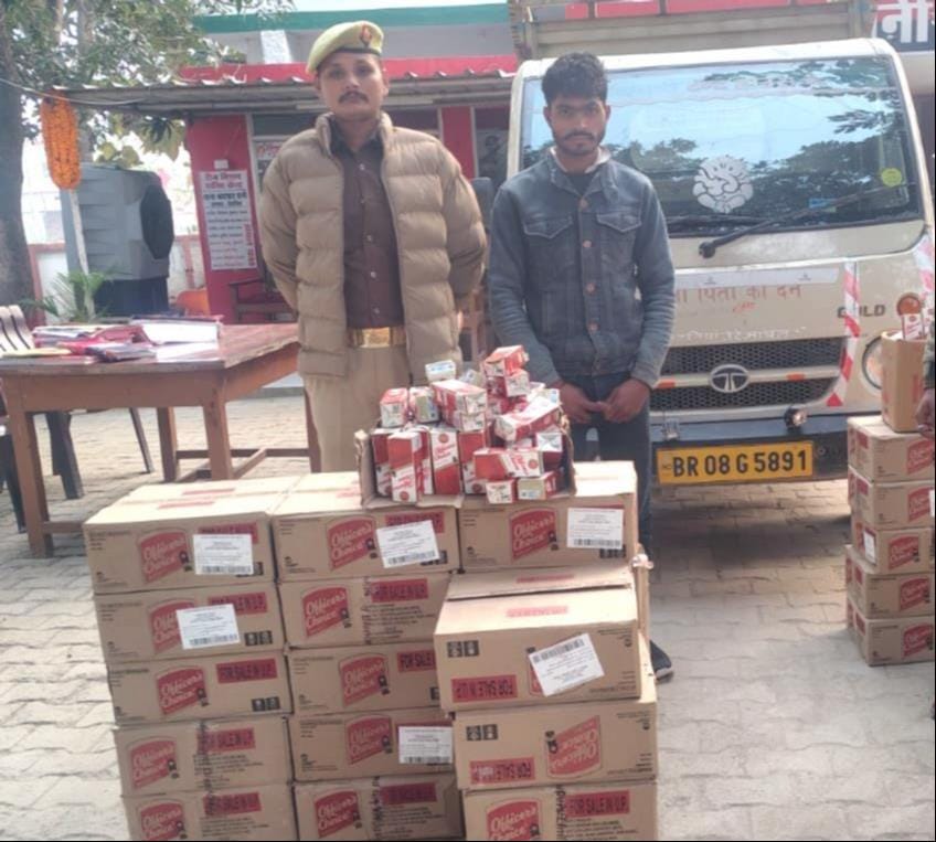 Police arrested a smuggler with 35 boxes of illicit liquor.