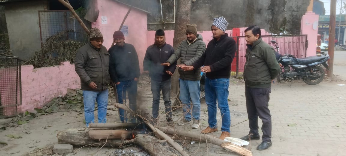 Dense fog and biting cold, people shivered.