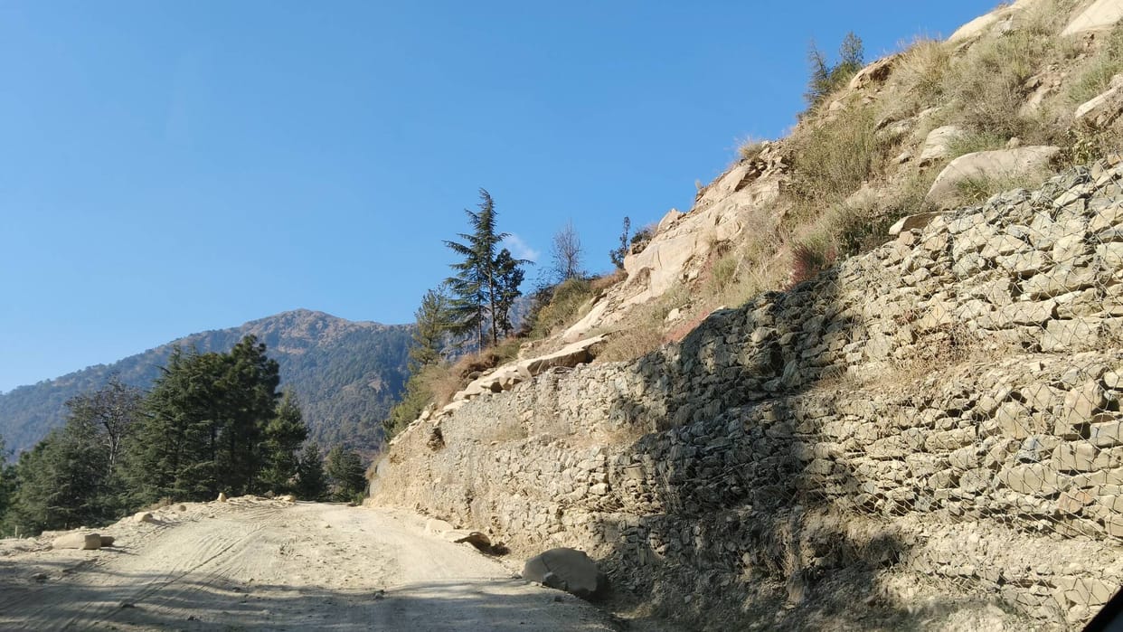 Debris and stones on the sides and top of Katola road ready to wreak havoc