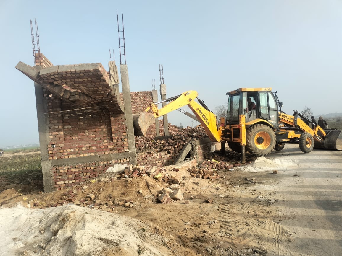 Bulldozers demolished an illegal colony being built on 70 acres of land in Balaur.