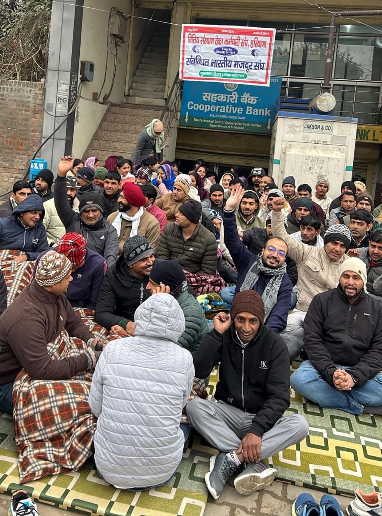 Co-operative bank employees stage protest against discrimination in service security law