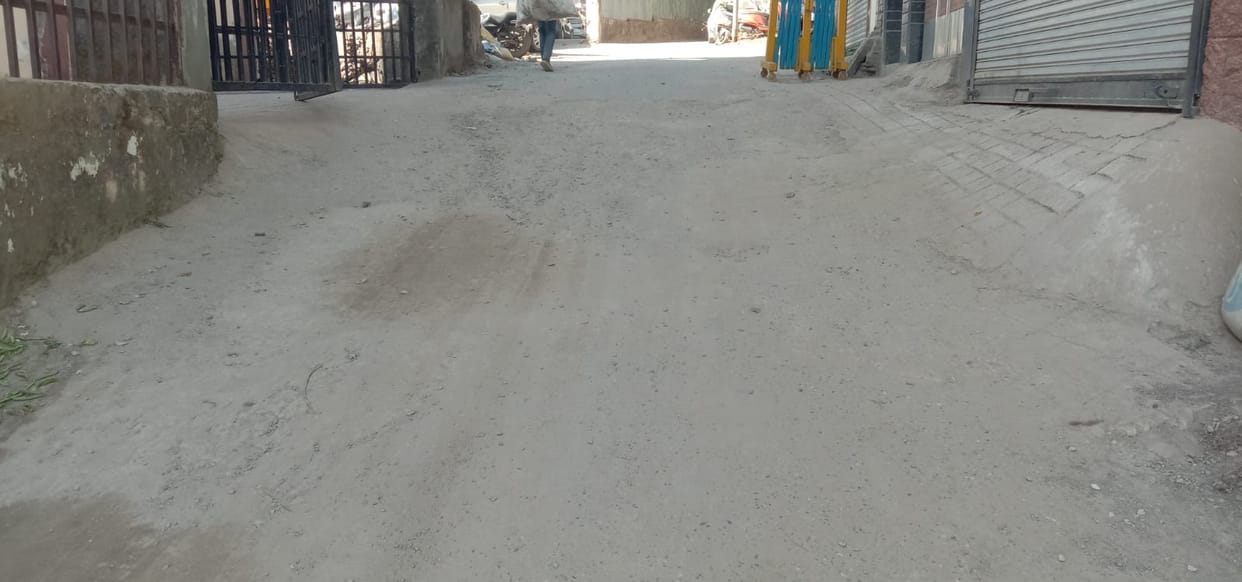 The city council filled the potholes in the road by doing patchwork, providing relief to the people