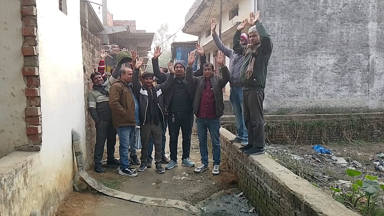Angry residents staged a protest due to the lack of drainage system construction.