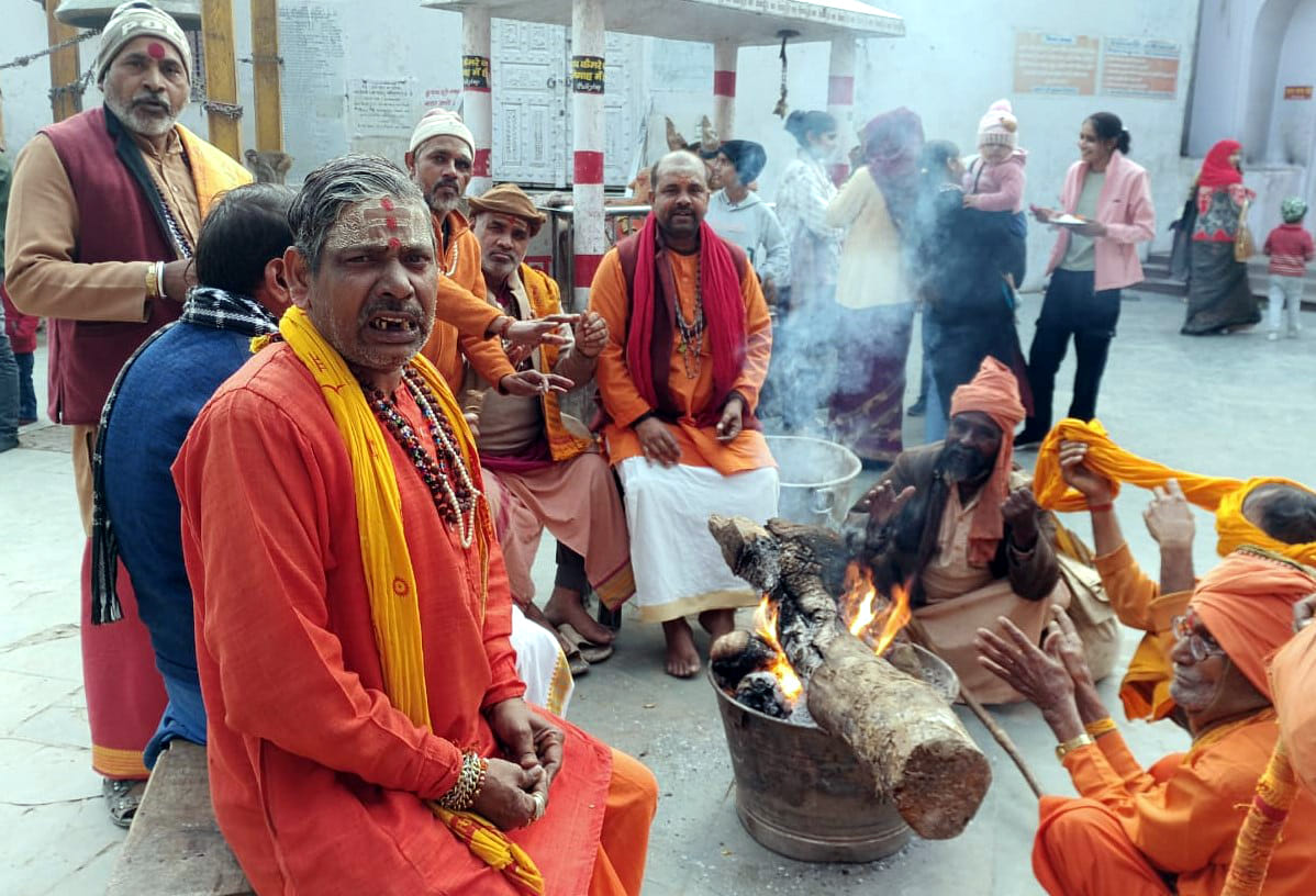 The severity of winter, saints take shelter by bonfire in Bateshwar
