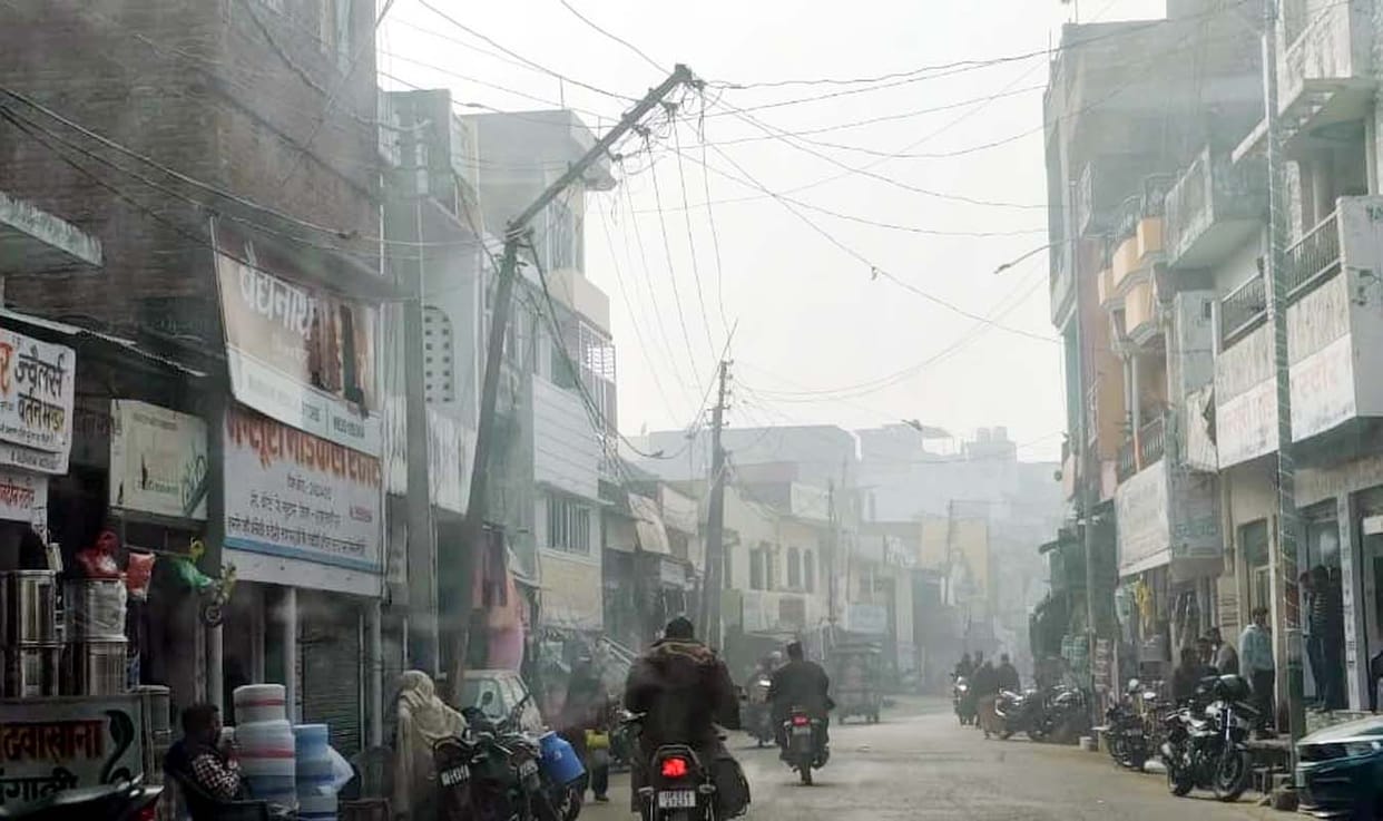An electric pole is leaning towards the main road in Khutar; an accident could happen.